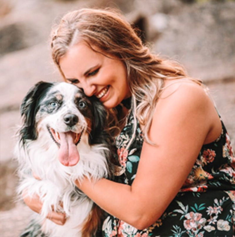 An image of Tristyn Sipsy, the copywriter and content writer behind Sipsy Ink, with her dog.